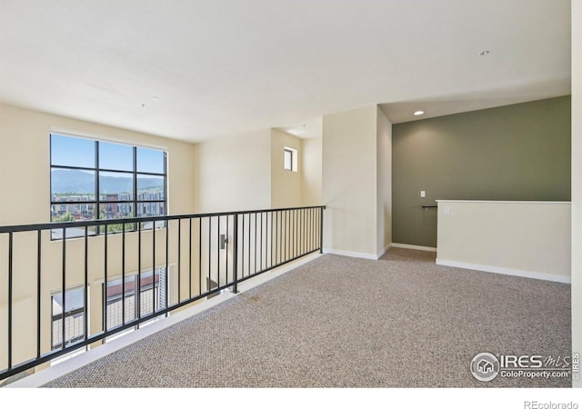 1200 Yarmouth Ave Unit 237, Boulder, CO 80304 - unfurnished room featuring carpet flooring and baseboards