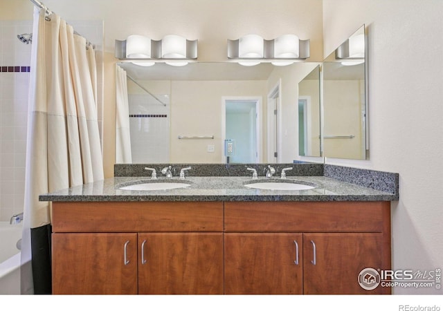 1200 Yarmouth Ave Unit 237, Boulder, CO 80304 - bathroom with double vanity and shower / bath combo