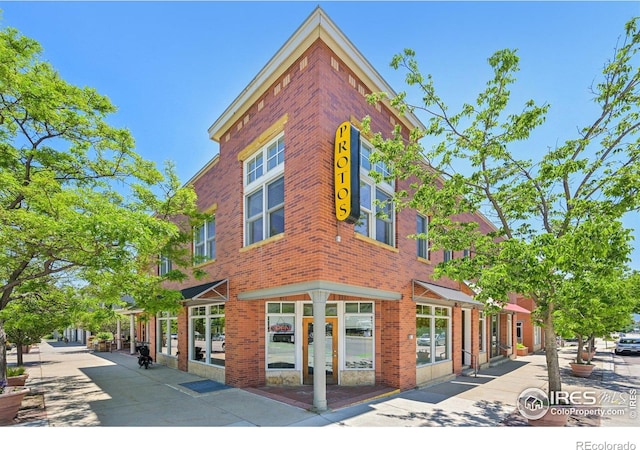 1200 Yarmouth Ave Unit 237, Boulder, CO 80304 - view of side of property featuring brick siding and french doors
