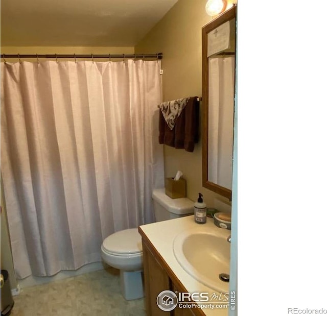 205-207 W 3rd Ave, Wiggins, CO 80654 - bathroom with vanity and curtained shower