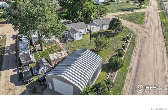 205-207 W 3rd Ave, Wiggins, CO 80654 - aerial perspective of suburban area