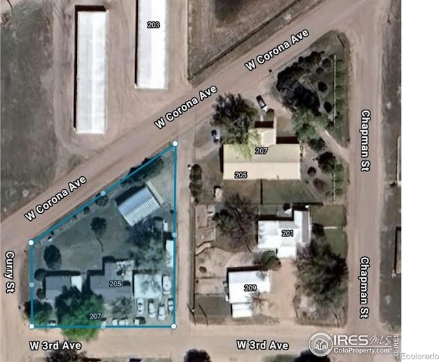 205-207 W 3rd Ave, Wiggins, CO 80654 - aerial overview of property's location featuring property boundaries highlighted