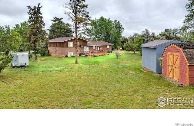 8840 Niwot Rd, Niwot, CO 80503 - view of green lawn with a shed and a deck