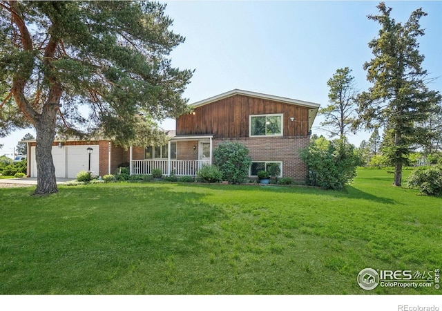 8840 Niwot Rd, Niwot, CO 80503 - view of front of home with a garage, a front yard, a porch, and brick siding