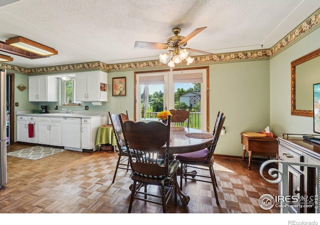 8840 Niwot Rd, Niwot, CO 80503 - dining area featuring a textured ceiling and a ceiling fan