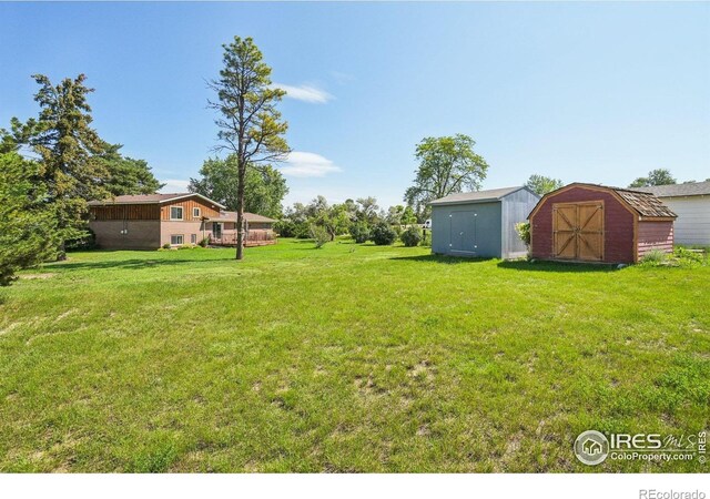 8840 Niwot Rd, Niwot, CO 80503 - view of grassy yard with a shed