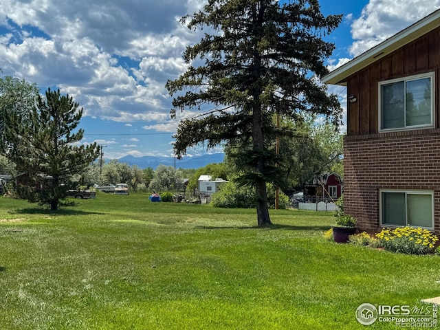 8840 Niwot Rd, Niwot, CO 80503 - view of green lawn with a mountain view