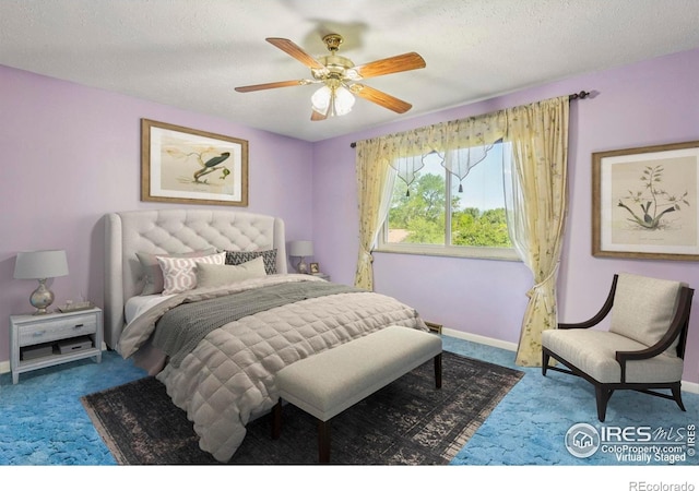 8840 Niwot Rd, Niwot, CO 80503 - carpeted bedroom featuring a ceiling fan and a textured ceiling