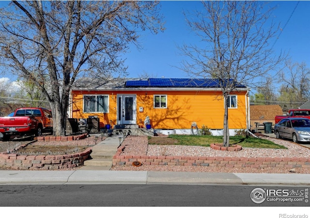 7970 Wolff Ct, Westminster, CO 80030 - view of front of property featuring solar panels