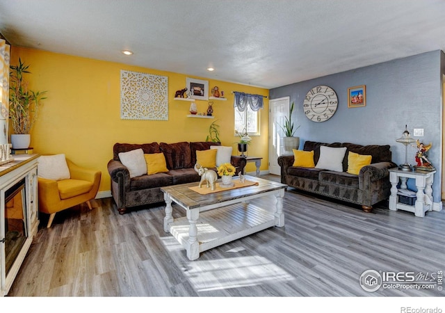 7970 Wolff Ct, Westminster, CO 80030 - living area featuring wood finished floors and recessed lighting