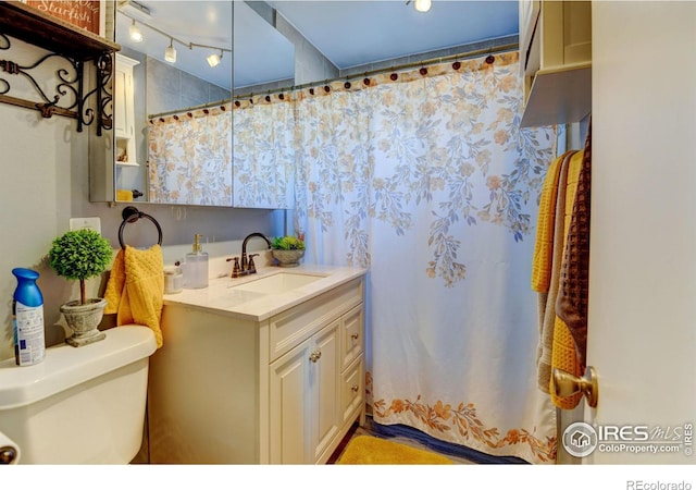 7970 Wolff Ct, Westminster, CO 80030 - full bathroom featuring vanity and a shower with shower curtain