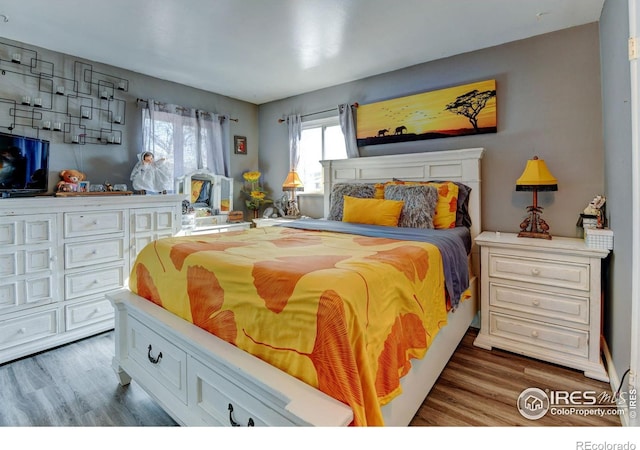 7970 Wolff Ct, Westminster, CO 80030 - bedroom with wood finished floors