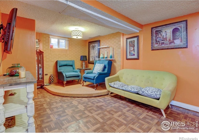 7970 Wolff Ct, Westminster, CO 80030 - sitting room featuring a textured ceiling