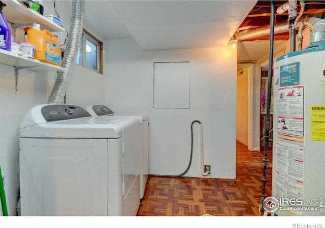 7970 Wolff Ct, Westminster, CO 80030 - laundry area with gas water heater and washing machine and dryer