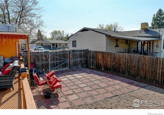 7970 Wolff Ct, Westminster, CO 80030 - fenced backyard with a patio