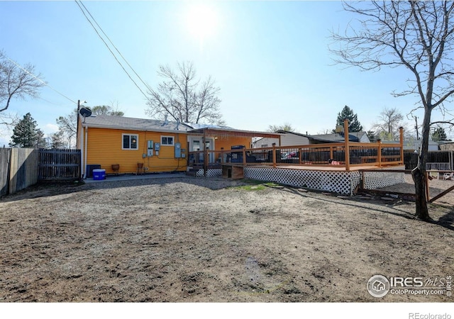 7970 Wolff Ct, Westminster, CO 80030 - back of house featuring a deck and a fenced backyard