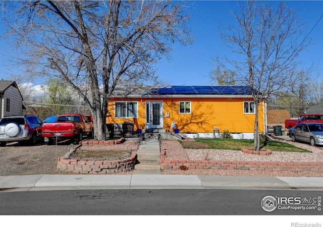 7970 Wolff Ct, Westminster, CO 80030 - view of front facade with roof mounted solar panels