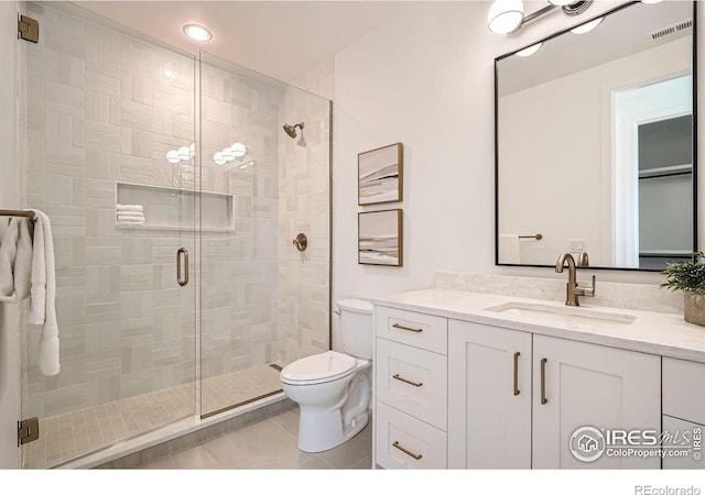1126 W Enclave Cir, Louisville, CO 80027 - bathroom featuring a stall shower, vanity, tile patterned floors, and recessed lighting