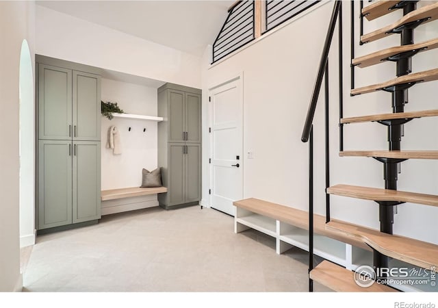 1126 W Enclave Cir, Louisville, CO 80027 - mudroom with high vaulted ceiling and baseboards