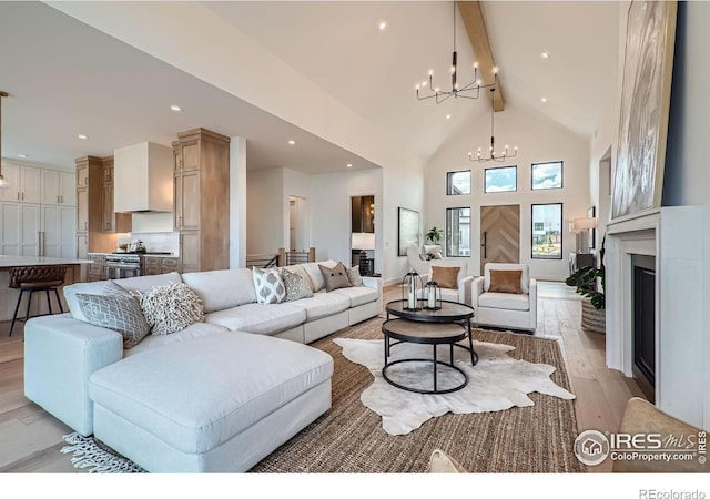 1126 W Enclave Cir, Louisville, CO 80027 - living area featuring a chandelier, light wood-type flooring, beamed ceiling, high vaulted ceiling, and recessed lighting