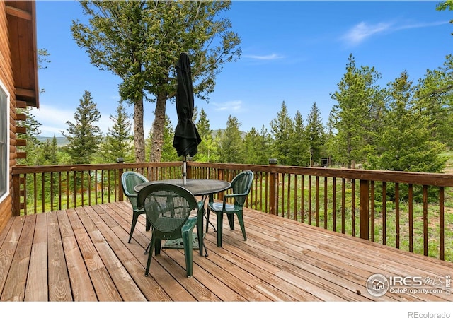 90 Woccon Ct, Red Feather Lakes, CO 80545 - wooden terrace featuring outdoor dining area