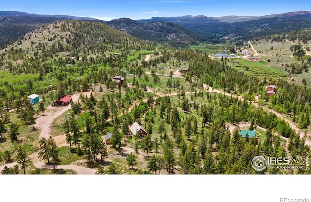 90 Woccon Ct, Red Feather Lakes, CO 80545 - aerial view of a mountainous background and a forest