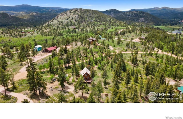 90 Woccon Ct, Red Feather Lakes, CO 80545 - drone / aerial view of a mountain backdrop and a forest