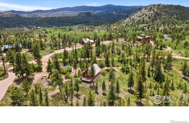 90 Woccon Ct, Red Feather Lakes, CO 80545 - drone / aerial view of a mountain backdrop and a forest