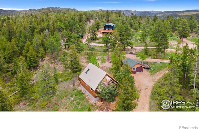 90 Woccon Ct, Red Feather Lakes, CO 80545 - view from above of property featuring a forest and a mountain backdrop