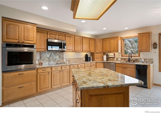 366 N Rim Rd, Livermore, CO 80536 - kitchen with appliances with stainless steel finishes, light stone counters, light tile patterned floors, decorative backsplash, and a kitchen island