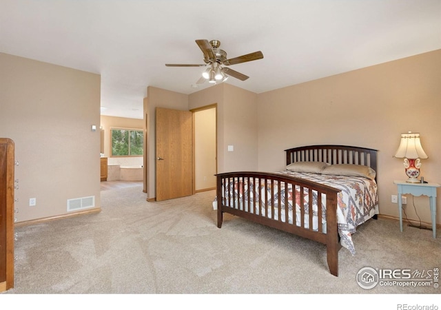 366 N Rim Rd, Livermore, CO 80536 - bedroom featuring carpet flooring, connected bathroom, and a ceiling fan