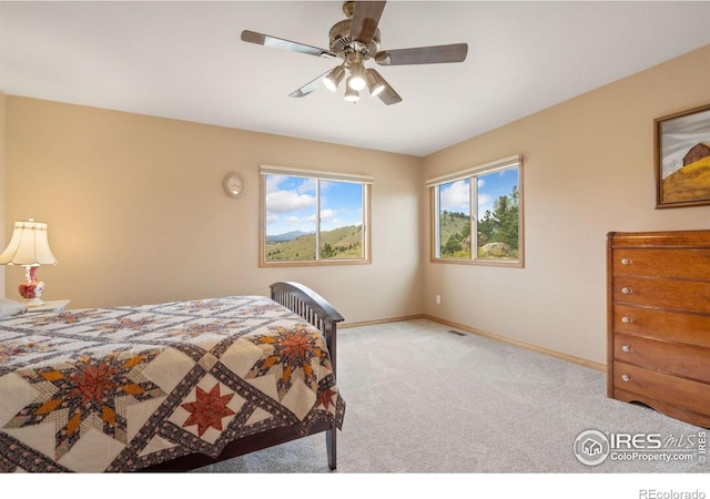 366 N Rim Rd, Livermore, CO 80536 - bedroom with carpet floors and ceiling fan