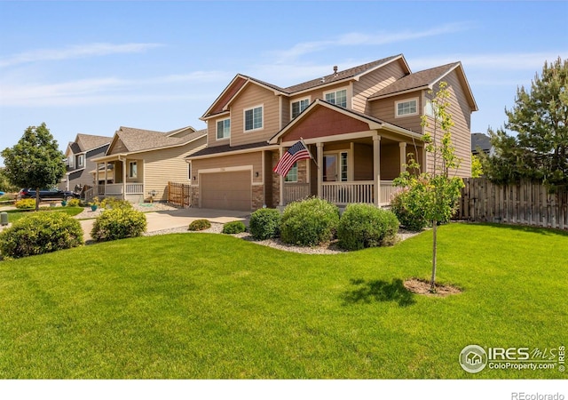 7266 Andover St, Wellington, CO 80549 - craftsman-style home featuring a porch, an attached garage, concrete driveway, and stone siding