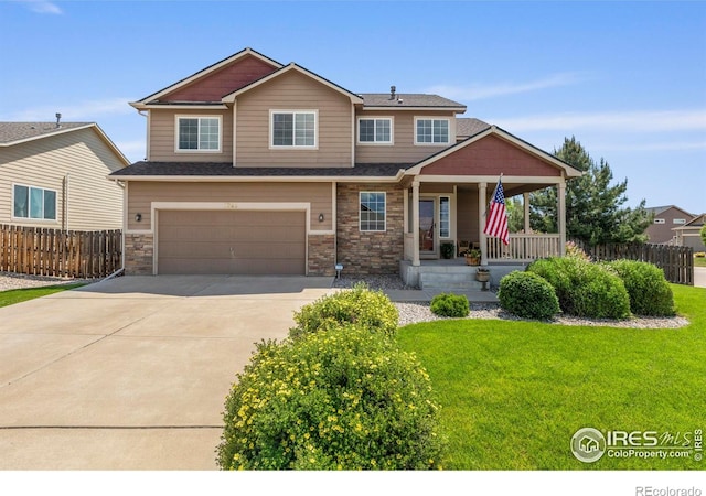 7266 Andover St, Wellington, CO 80549 - craftsman inspired home with covered porch, concrete driveway, and an attached garage