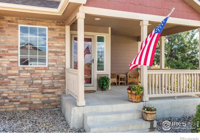 7266 Andover St, Wellington, CO 80549 - property entrance with a porch