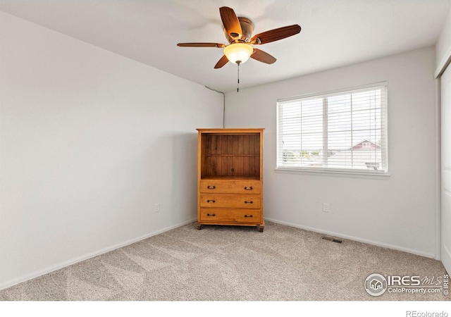 7266 Andover St, Wellington, CO 80549 - carpeted bedroom featuring baseboards and a ceiling fan
