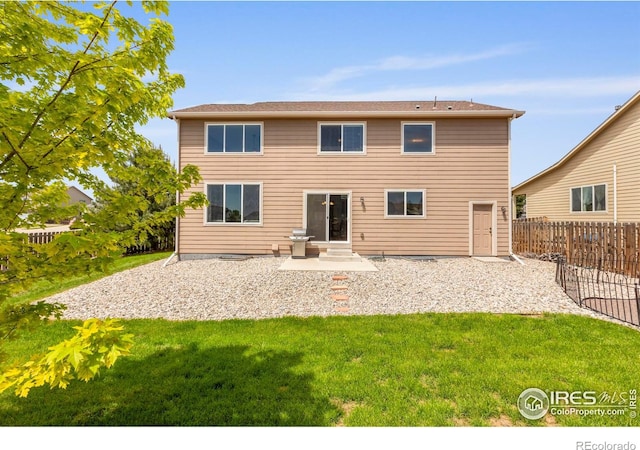7266 Andover St, Wellington, CO 80549 - rear view of property featuring a patio
