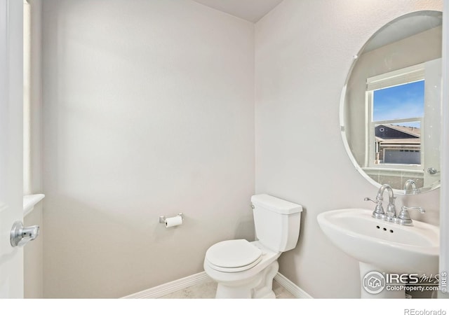 5562 Bristow Rd, Timnath, CO 80547 - bathroom with toilet and baseboards