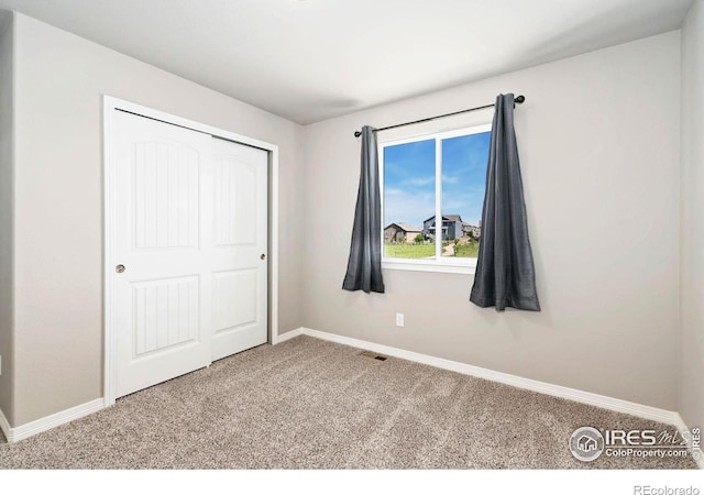 5562 Bristow Rd, Timnath, CO 80547 - unfurnished bedroom with carpet floors and a closet