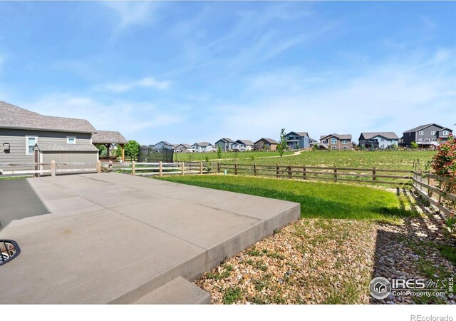5562 Bristow Rd, Timnath, CO 80547 - view of yard featuring a residential view and a patio
