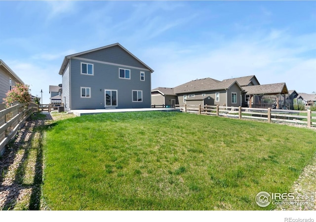 5562 Bristow Rd, Timnath, CO 80547 - back of property with a fenced backyard and a patio area