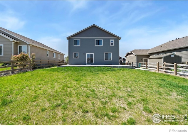 5562 Bristow Rd, Timnath, CO 80547 - back of property with a patio area and a fenced backyard