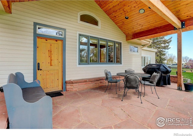 9445 Lykins Pl, Boulder, CO 80301 - view of patio with a grill and outdoor dining space
