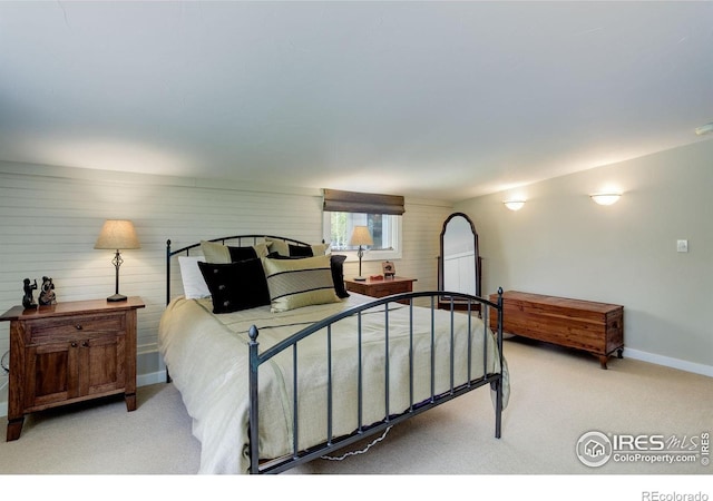 9445 Lykins Pl, Boulder, CO 80301 - carpeted bedroom with arched walkways and wood walls
