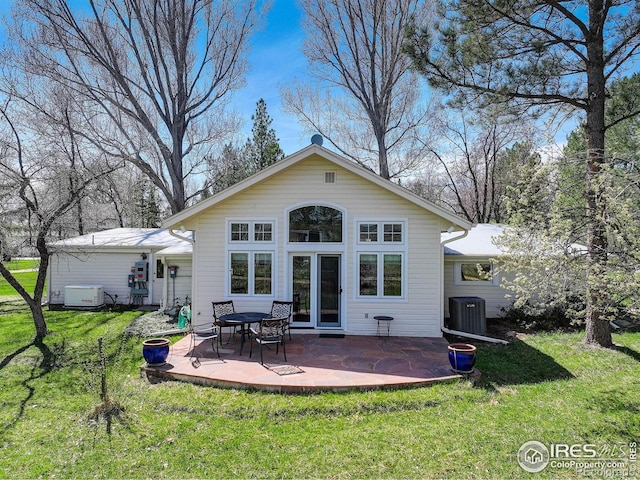 9445 Lykins Pl, Boulder, CO 80301 - back of property featuring a yard and a patio