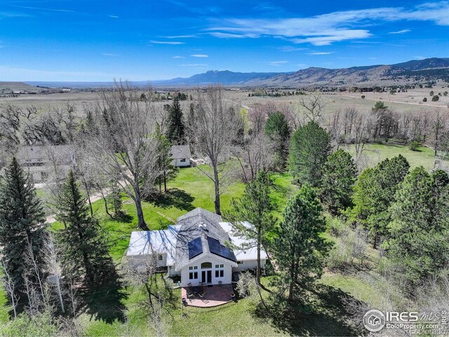 9445 Lykins Pl, Boulder, CO 80301 - view of subject property with a mountain backdrop