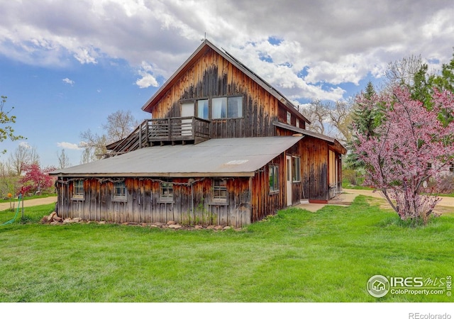 9445 Lykins Pl, Boulder, CO 80301 - back of property with a lawn