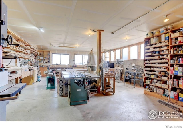 9445 Lykins Pl, Boulder, CO 80301 - garage featuring a workshop area