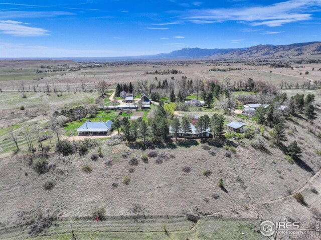 9445 Lykins Pl, Boulder, CO 80301 - aerial view of sparsely populated area with a mountain backdrop