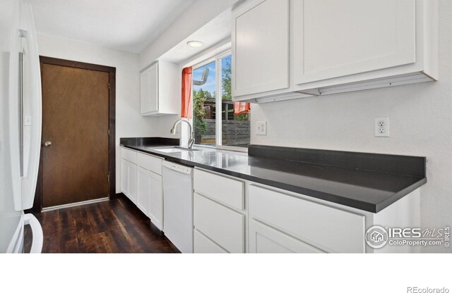 2013 Ridgewood Rd, Fort Collins, CO 80526 - kitchen featuring white appliances, dark countertops, white cabinetry, and dark wood-style floors